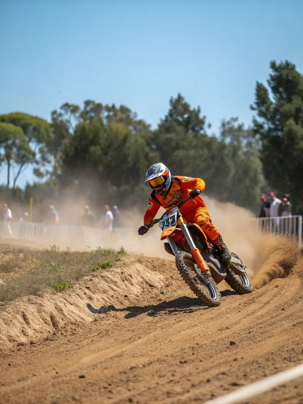 A group of motocross riders participating in a race event organized by MOTO CLUB DE PRANZAC. The image showcases the excitement and competitive spirit of the event, with riders closely competing for the lead.